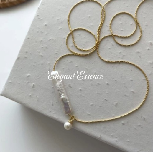 14k gold long baroque necklace.