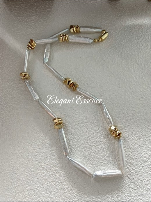 14k gold baroque necklace.